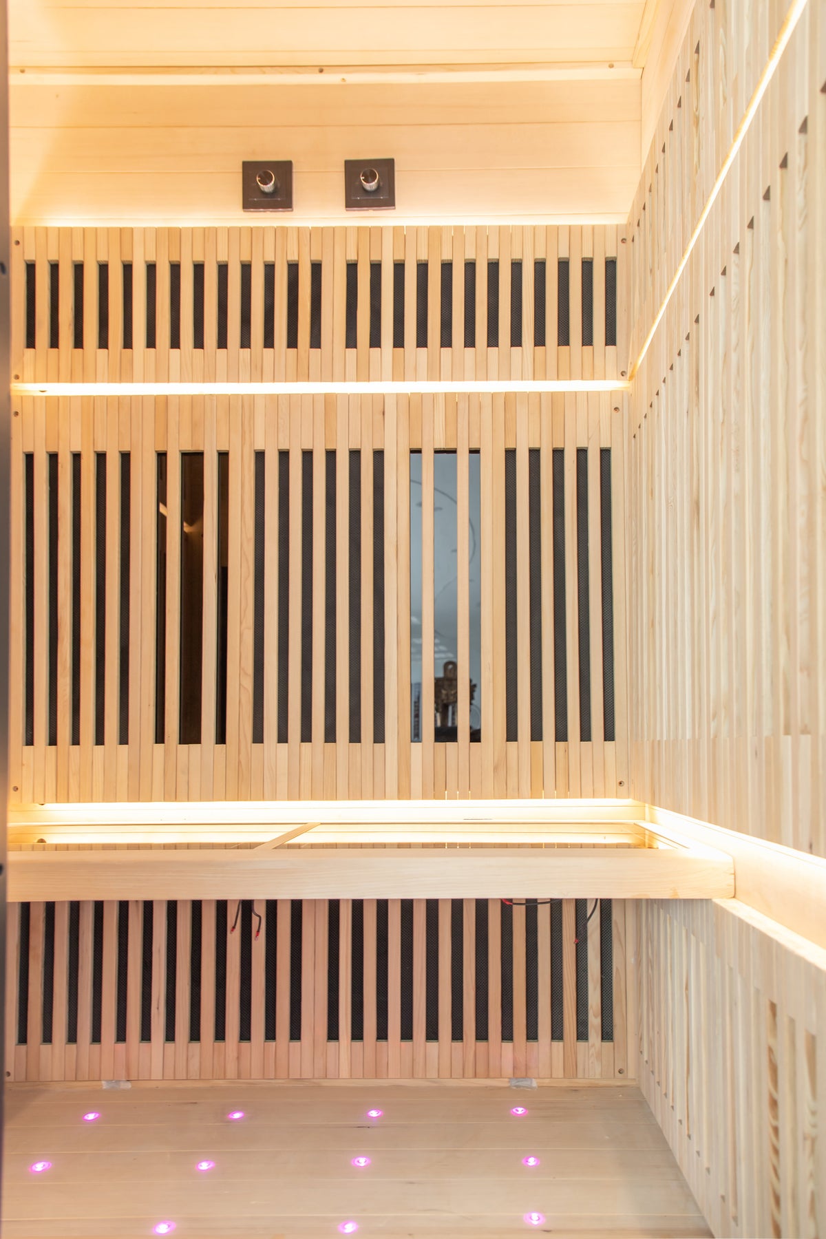 NiceBeam sauna interior with bench and backrest heaters