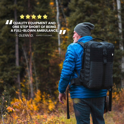 Hiker carrying The Medic PRO medical kit backpack in the woods, with review quote
