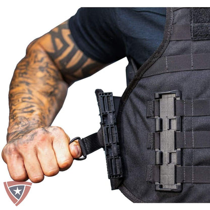 Adjusting the side strap on the Citizen Armor SHTF tactical vest
