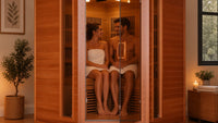 Couple in corner infrared sauna at home